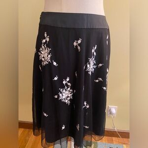 Aline beautiful skirt, embroidered tule overlay. Nicely lined
